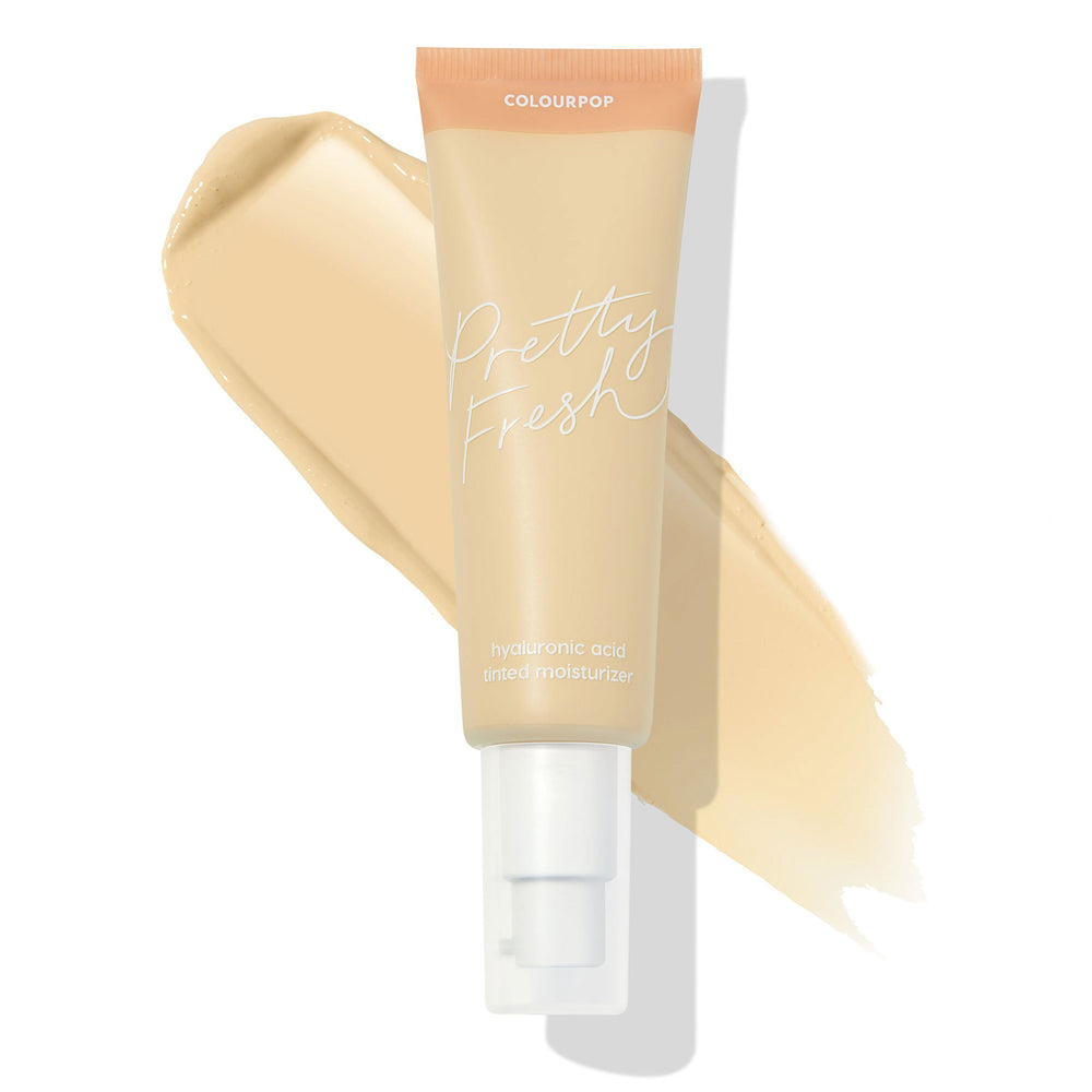 ColourPop Pretty Fresh Tinted Moisturizer in Fair 2 W features a peach-capped tube with white pump over a light beige swatch, highlighting the hyaluronic acid formula and fair warm tone on a clean white background.