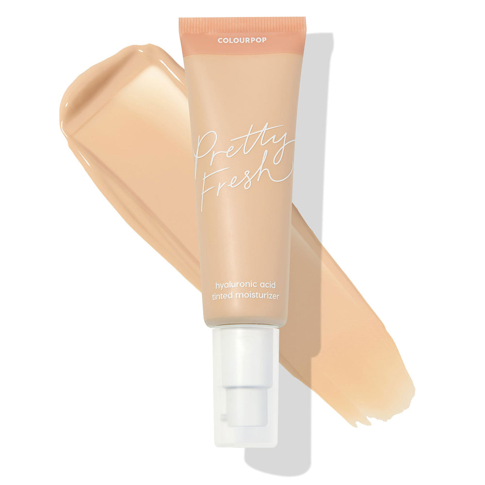 ColourPop Pretty Fresh Tinted Moisturizer in Fair 4 N shown in a pump tube over a beige swatch, highlighting the neutral fair shade and hyaluronic acid formula, peach-nude packaging with Pretty Fresh script on a white background.