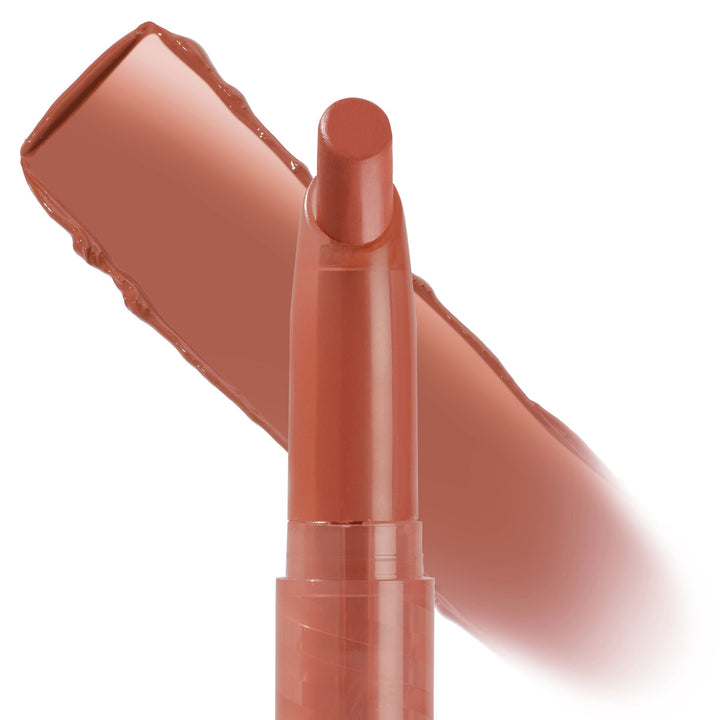 At Twilight ColourPop Lippie Stix shown uncapped and upright, a warm terracotta nude bullet with a creamy satin finish, set against a bold swipe swatch on a white backdrop, highlighting the slim, precise twist-up design.