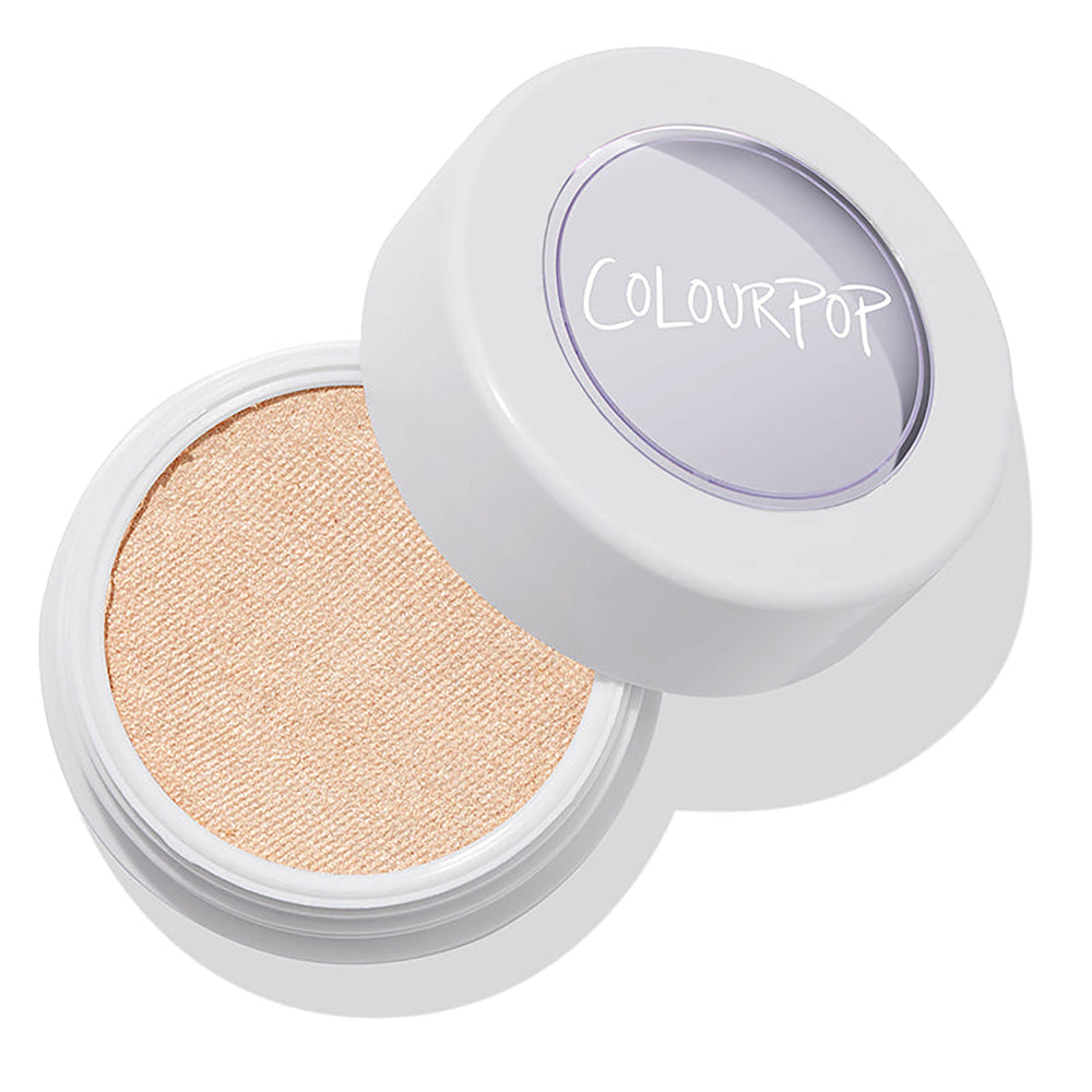 ColourPop Lunch Money Super Shock Highlighter - open white round pot revealing a pale champagne shimmer, lid tilted to show the ColourPop logo, casting a soft shadow on a clean white background.