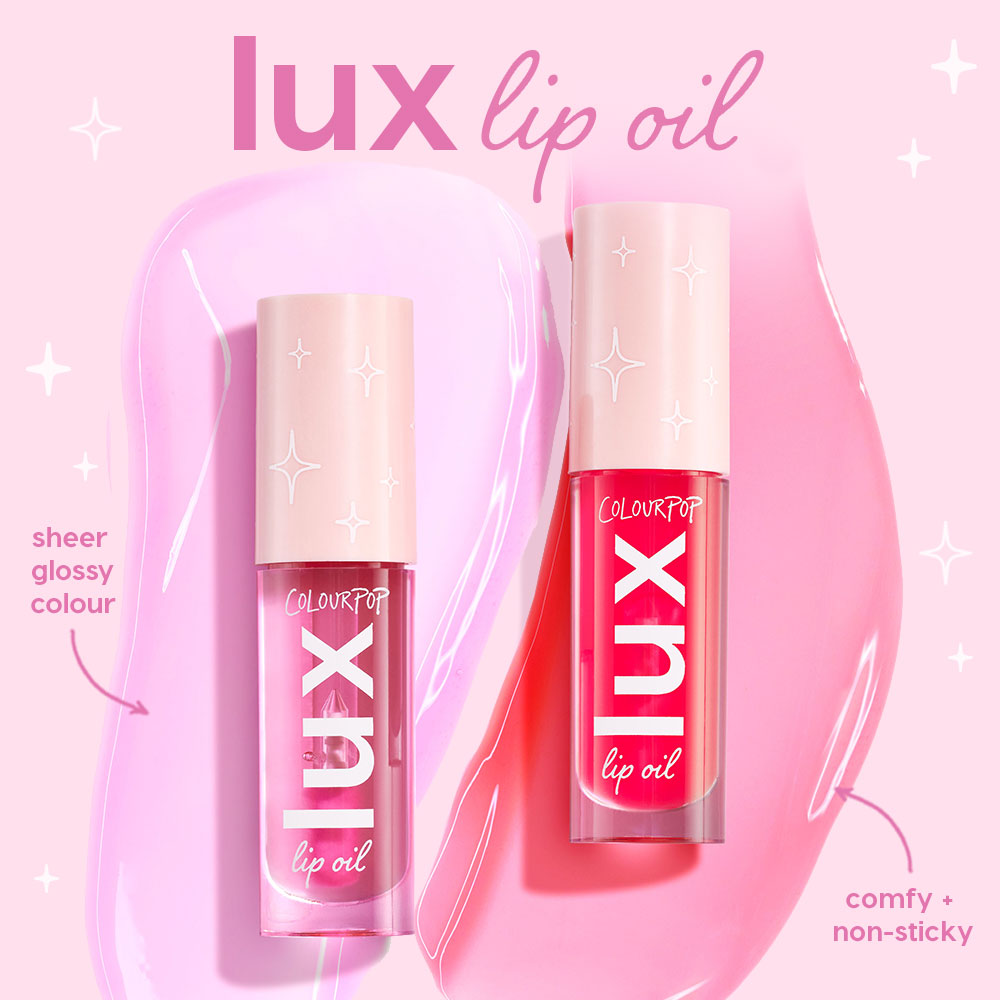 ColourPop Lux Lip Oil in Raspberry Mojito shown in two clear tubes with blush caps and star accents, set on pink swatches to demonstrate sheer glossy color and a comfy, non‑sticky finish - a hydrating lip oil tint ideal for everyday wear.