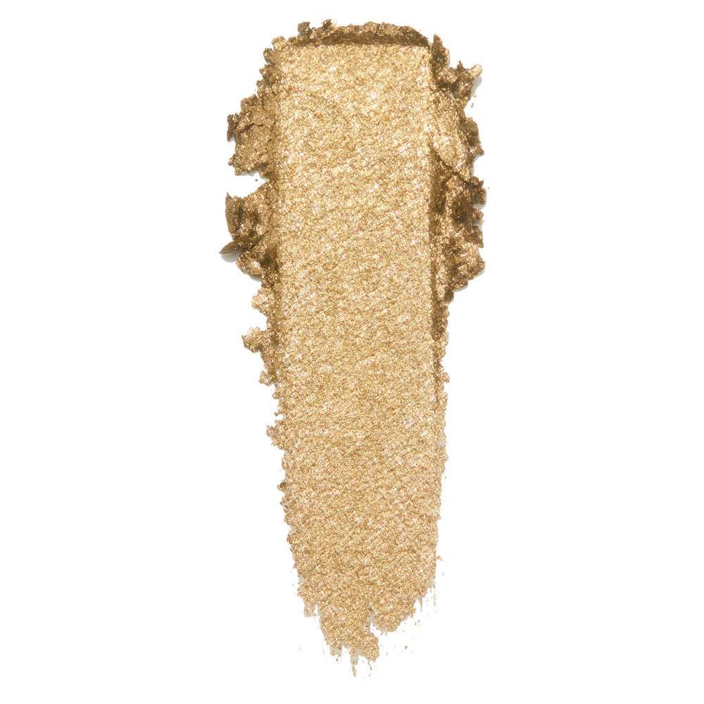 ColourPop Cheap Date Super Shock Shadow swatch - warm metallic gold eyeshadow smeared in a single vertical stroke, showcasing fine sparkle and creamy texture, against a clean white background.