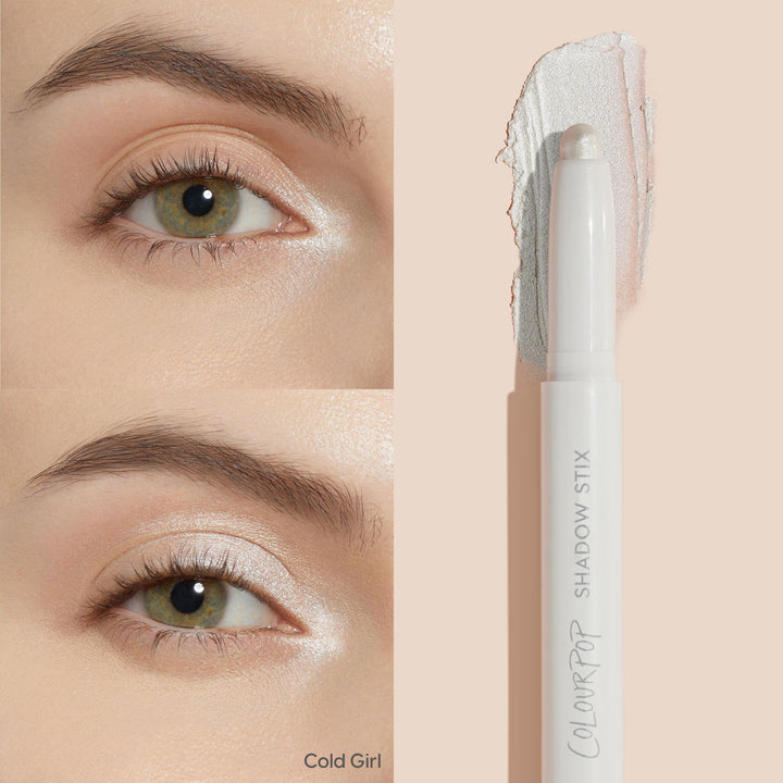 ColourPop Shadow Stix in Cold Girl highlighting eyelids - creamy twist-up stick swipes a frosty pearl shimmer across the lid and inner corner, shown on an eye with a side swatch and the white pen-style Shadow Stix packaging.
