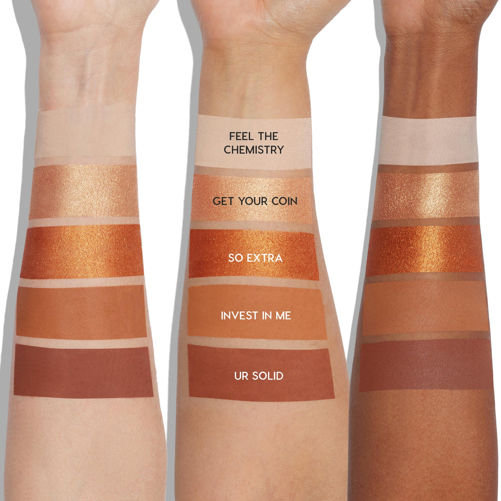 ColourPop Precious Metals shadow palette swatched on three arms against a white background, showing five shades - Feel the Chemistry (matte ivory), Get Your Coin (shimmery gold), So Extra (metallic copper), Invest In Me (matte caramel), Ur Solid (matte chestnut).