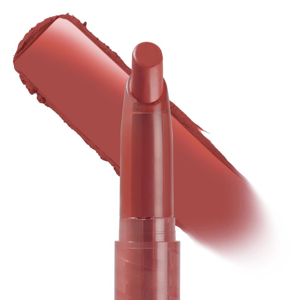 Goal Digger ColourPop Lippie Stix stands upright, showcasing a warm terracotta-rose bullet while a creamy swatch streaks behind on a white background, highlighting rich pigment and smooth, precise application.