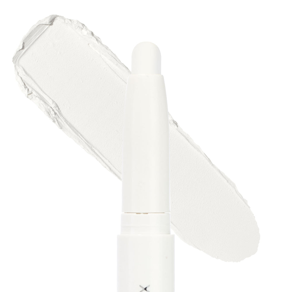 Hey Boo Shadow Stix glides a creamy matte white eyeshadow swatch on a white backdrop, showing the twist-up crayon tip and smooth texture; ColourPop Shadow Stix ideal for brightening lids, highlighting, or priming.
