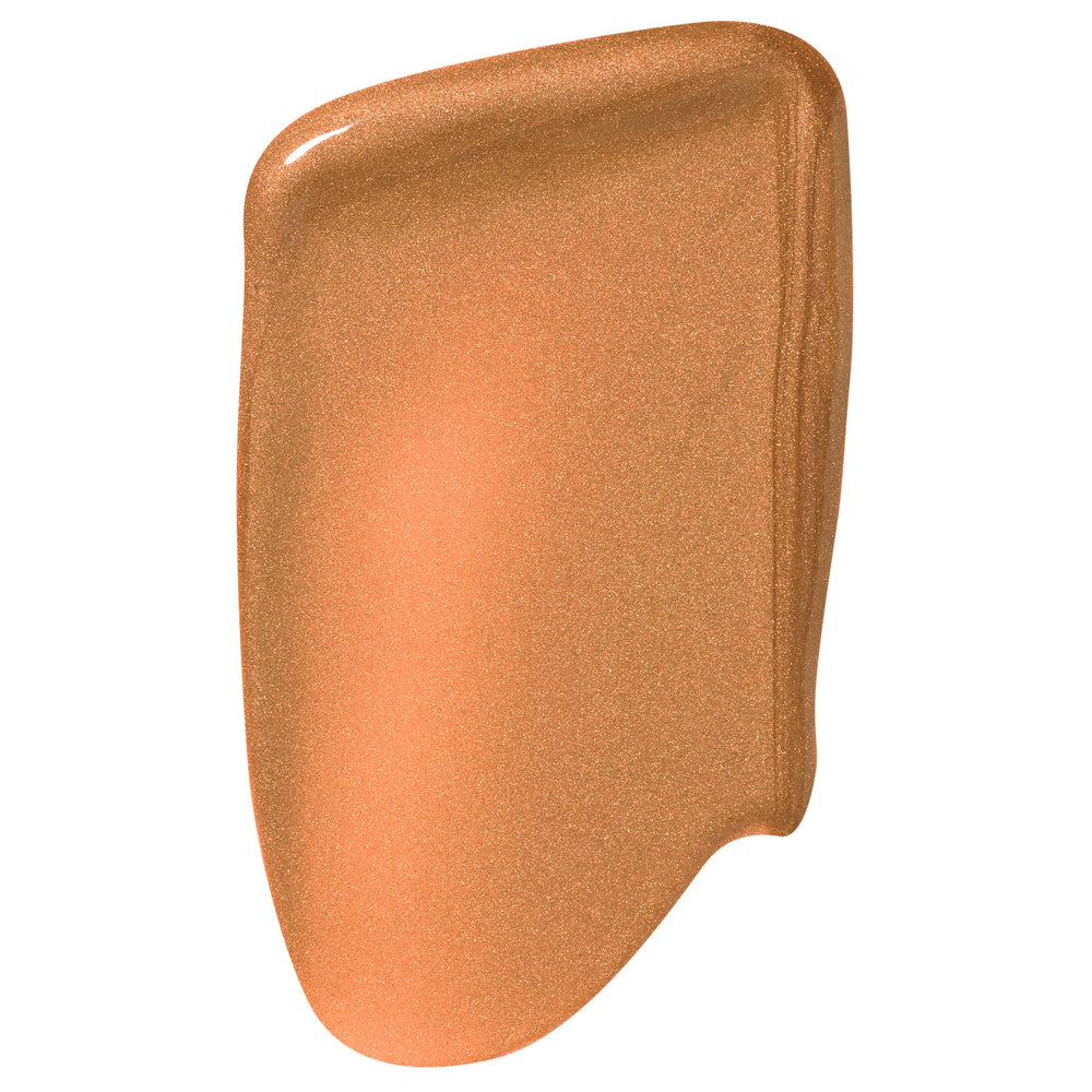Bronze Glow shade swatch gliding in a smooth, glossy streak, revealing a warm copper-bronze shimmer from ColourPop SOL Liquid Sun Glow Drops, with fine luminous sparkle on a white background.