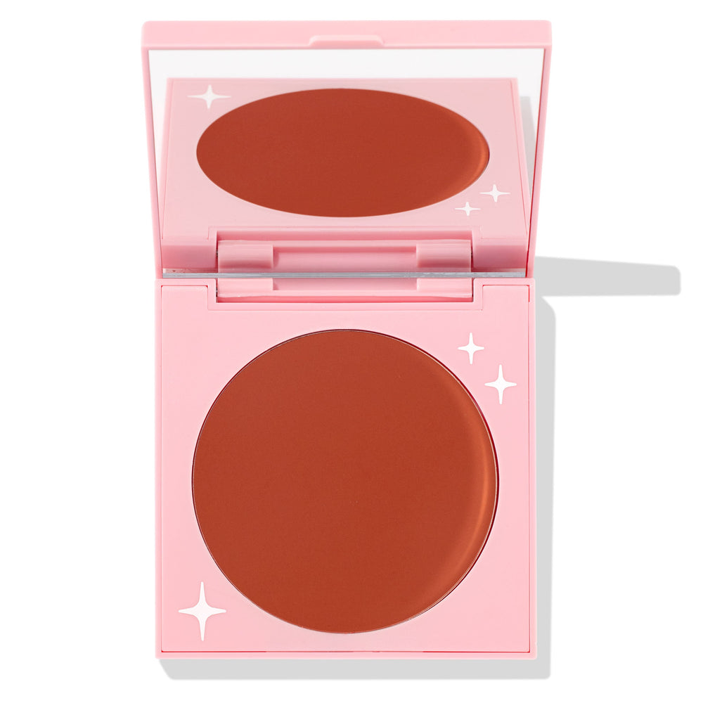 Sunset Strip ColourPop Cream Blush compact sits open to reveal a large round pan of warm terracotta matte pigment, set in a pink mirrored case with white star accents, photographed on a white background.
