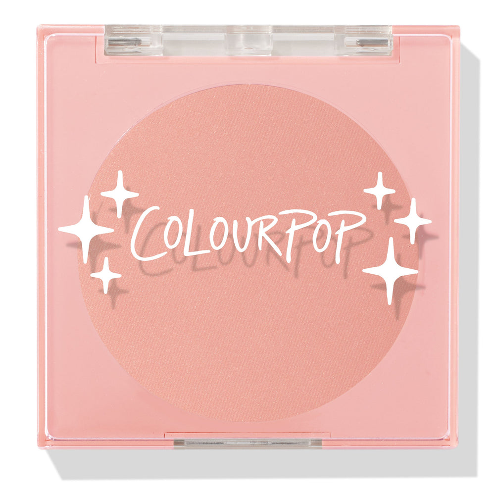 Why Hello ColourPop Pressed Powder Blush compact, closed, displaying a matte peach-pink pan under a clear lid with white ColourPop logo and sparkles, set in a light pink square case on a white studio background.